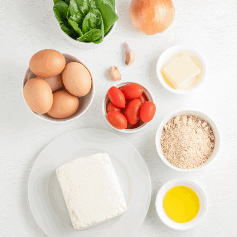 Ingredients needed for Easy Ina Garten's Quiche Recipe on kitchen table.