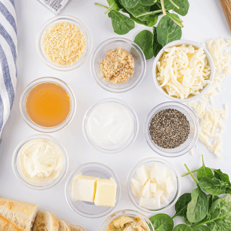 Ingredients for an easy Lipton Onion Soup Spinach Dip on the kitchen table.