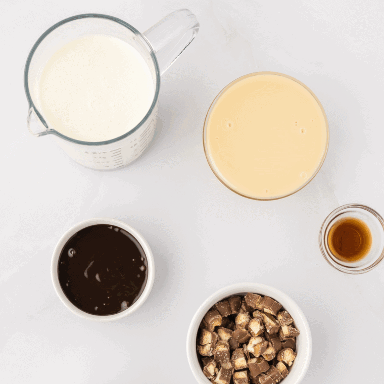 Ingredients needed for Easy Ninja Creami Butterbeer Ice Cream on kitchen table.