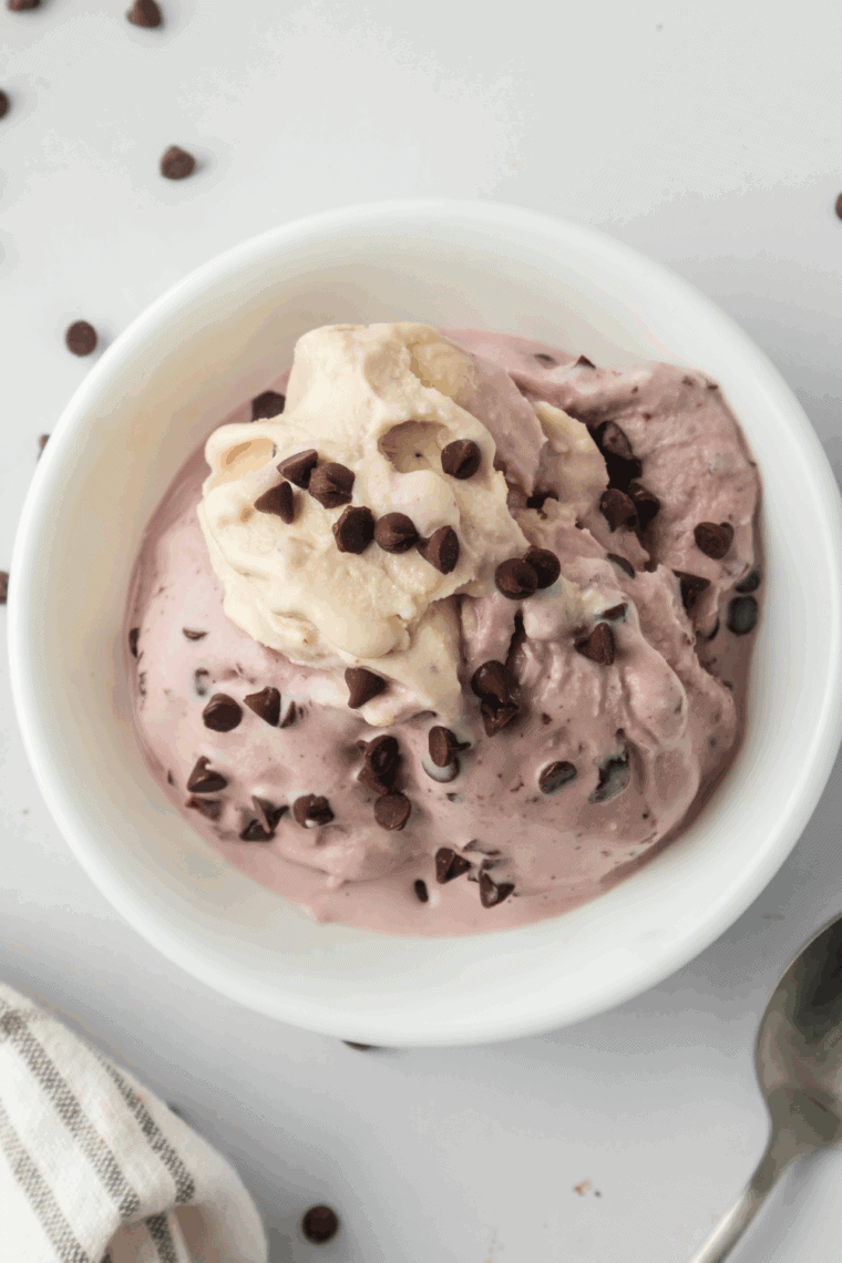 Make rich and creamy Ninja Creami Cherry Chocolate Ice Cream at home! Sweet cherries and chocolate pieces combine for a decadent, easy-to-make dessert.