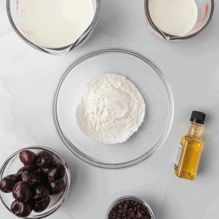 Ingredients needed for Easy Ninja Creami Cherry Chocolate Ice Creamon kitchen table.