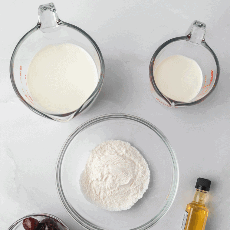 Ingredients needed for Easy Ninja Creami Lemon Ice Cream on kitchen table.