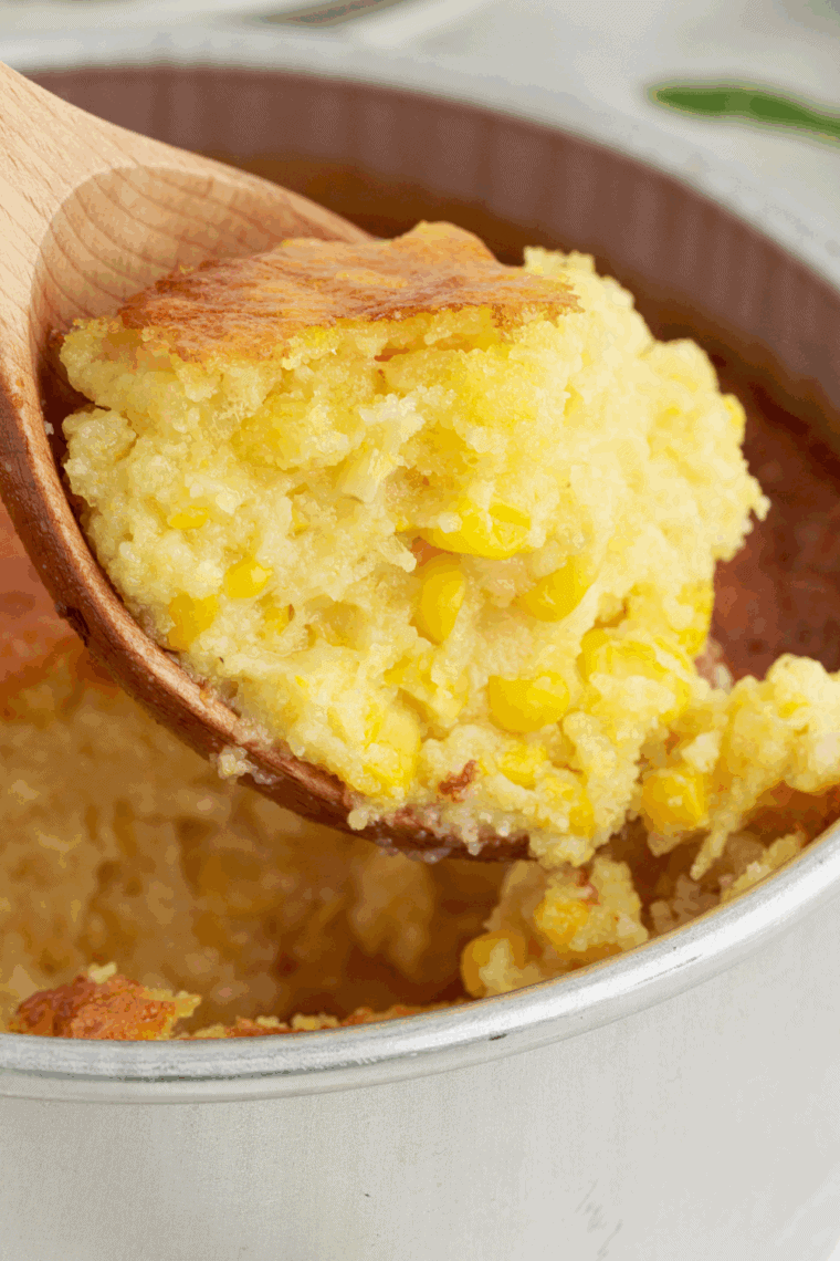 Baked Pioneer Woman corn casserole in a dish, golden brown and creamy, ready to serve.