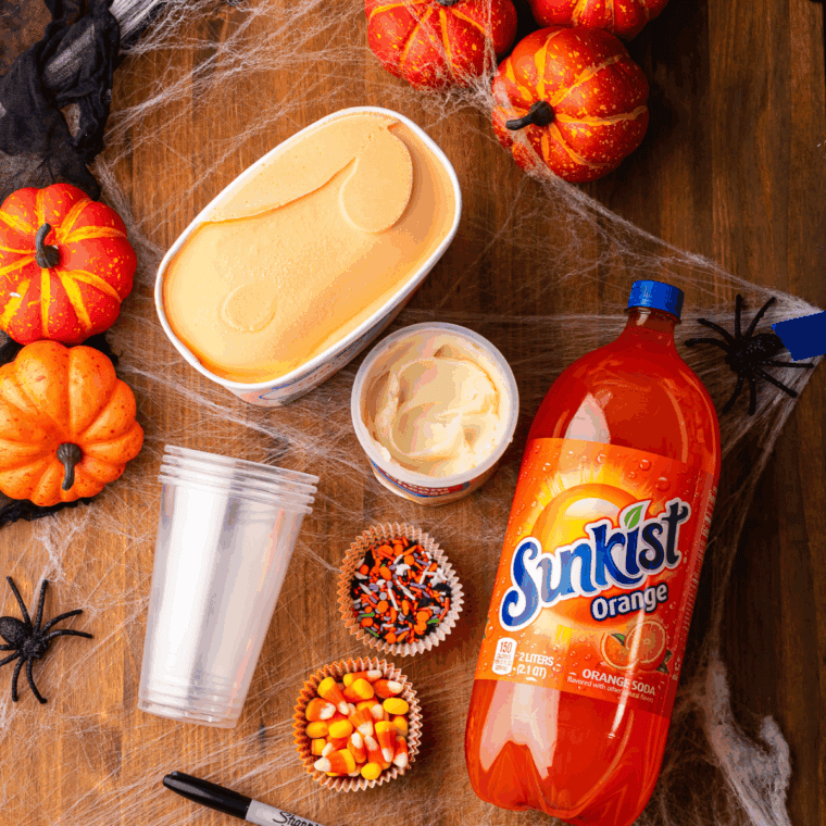 Ingredients needed for Fanta Jack O’Lantern Halloween Floats on kitchen table.
