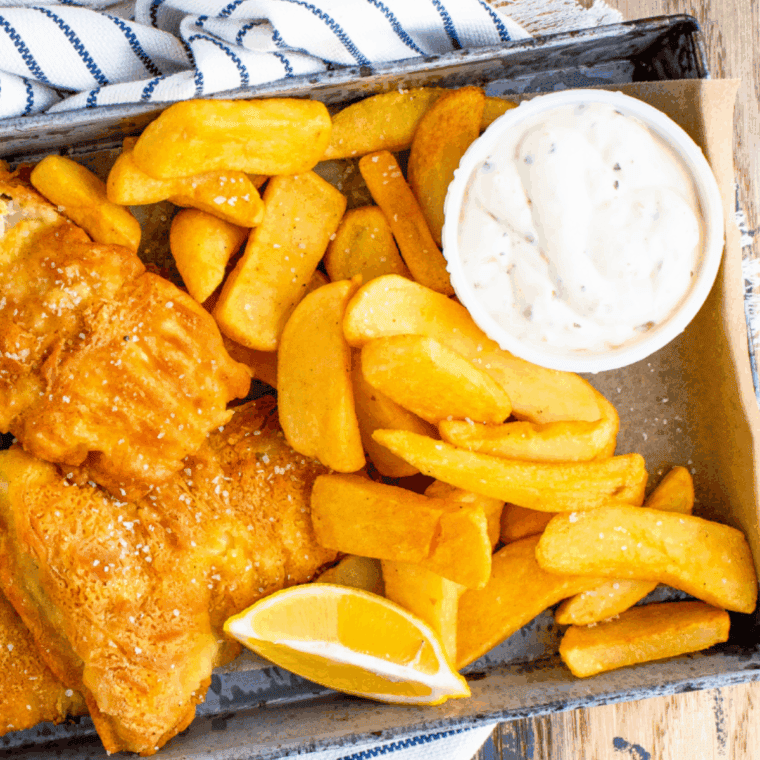 Creamy tartare sauce is served in bowls with fried fish, seafood or sandwiches.
