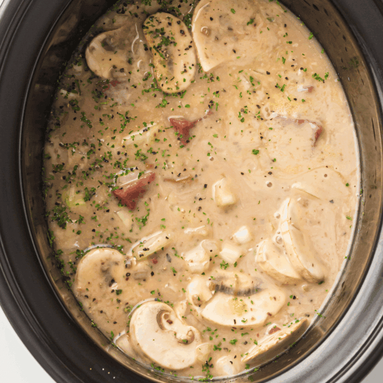 Making the stroganoff sauce by adding flour, beef broth, and Dijon mustard.