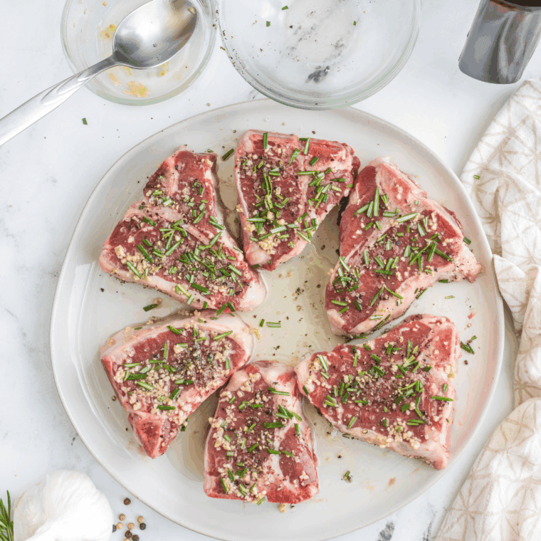 Preheating a grill to medium-high for grilling Moroccan lamb chops.