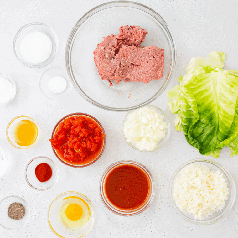 Ingredients needed for Ina Garten's Stuffed Cabbage Rolls on kitchen table.