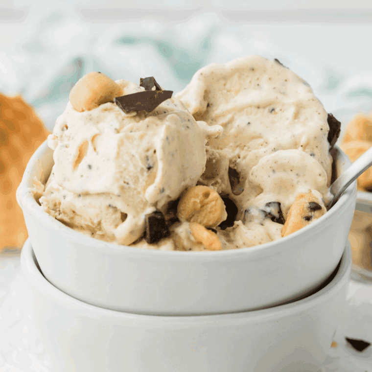Homemade Ninja Creami cookie dough ice cream with creamy vanilla base and cookie dough chunks in a bowl.