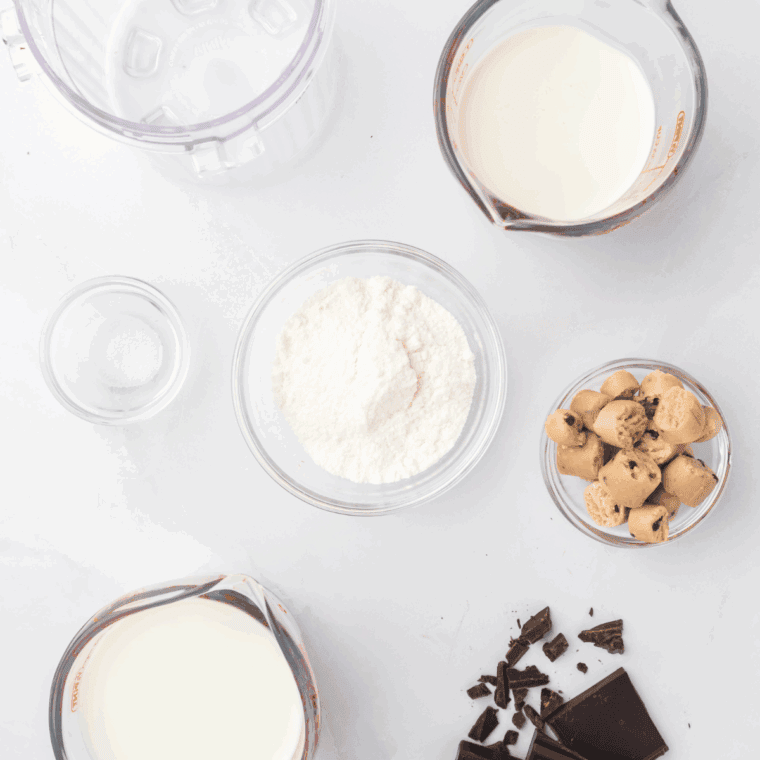 Ingredients needed for Ninja Creami Baskin Robbins Copycat Cookie Dough Ice Cream Recipe on kitchen table.