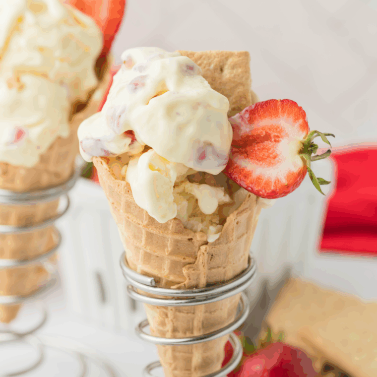 Homemade Ninja Creami Baseball Nut Ice Cream with raspberry swirl and roasted cashews.