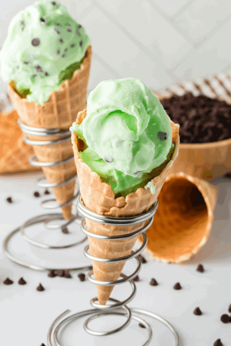 Ice cream cone of Ninja Creami Copycat Baskin Robbins Mint Chocolate Chip ice cream with chocolate chips.