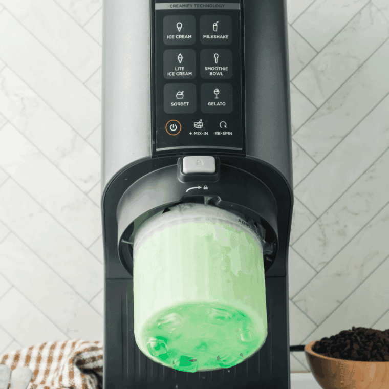 Insert the frozen pint into the Ninja Creami machine and select the Ice Cream function to process until creamy and smooth.