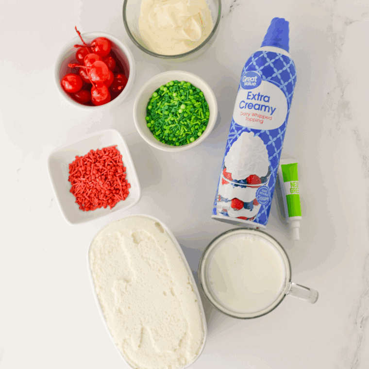 Ingredients needed for Ninja Creami Grinch Milkshake on kitchen table.