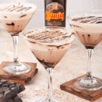 Icy Ninja Slushi Frozen Chocolate Martini served in a glass with chocolate drizzle.