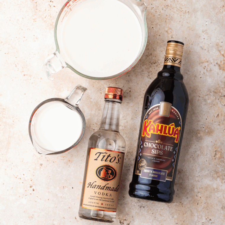 Ingredients needed for Ninja Slushi Frozen Chocolate Martini on kitchen table.