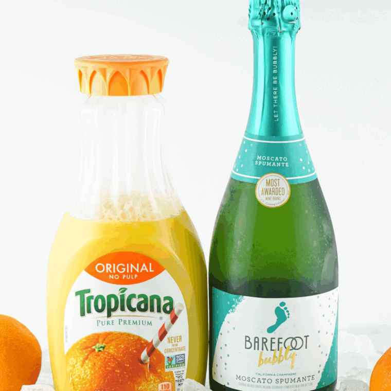 Ingredients needed for Easy Ninja Slushi Frozen Mimosa Recipe on kitchen table.