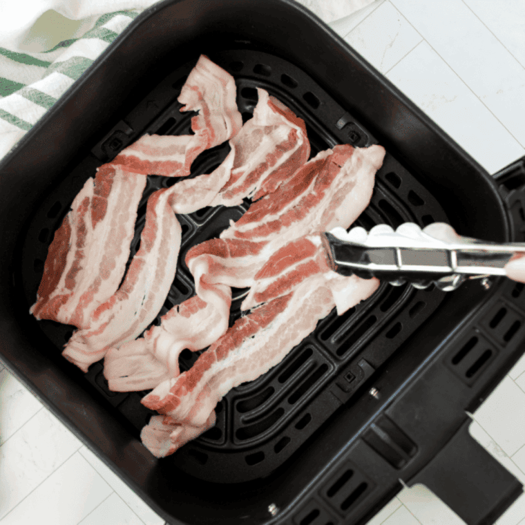 Cook bacon in the air fryer basket.