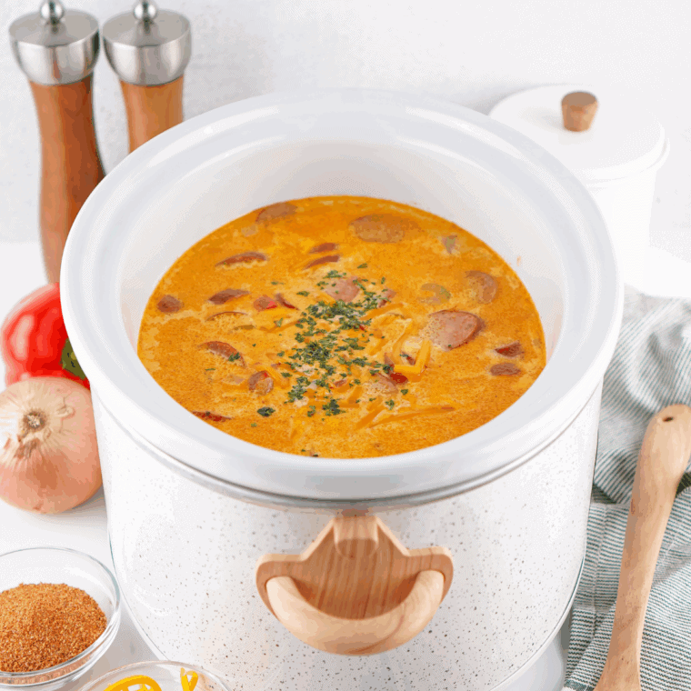 Creamy bowl of Red Lobster Bacon Potato Soup topped with crispy bacon, cheddar cheese, and green onions.