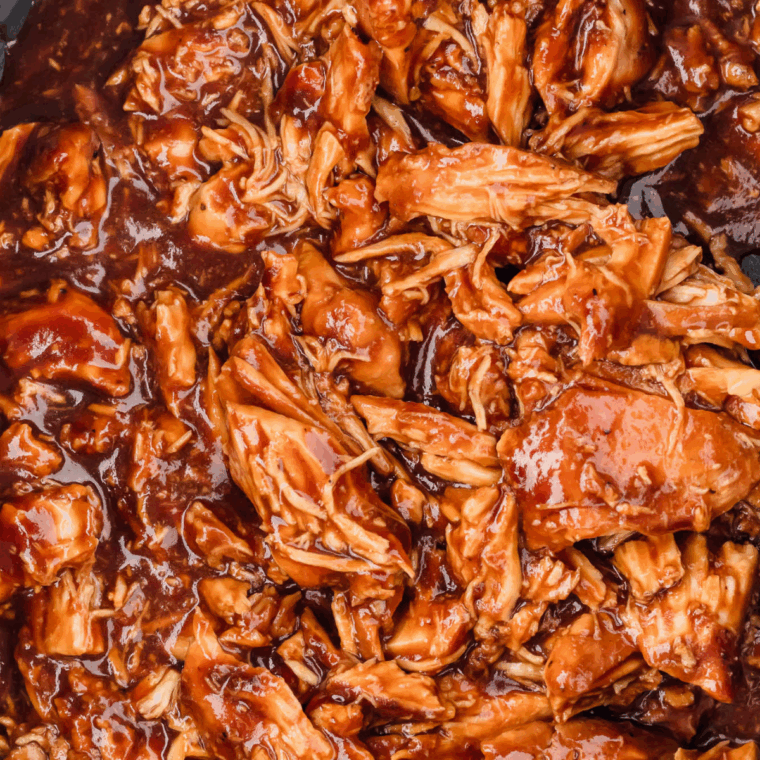 Juicy BBQ chicken cooked in the Ninja Foodi slow cooker, coated in rich barbecue sauce and ready to serve.