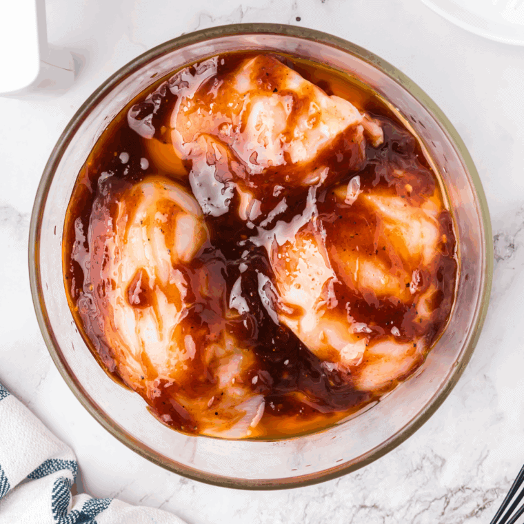 10 easy chicken marinades in small bowls, ready for grilling or cooking