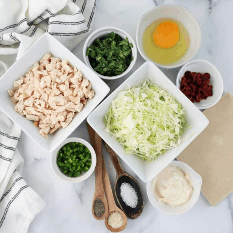 Chicken pieces marinating in a vibrant green Cilantro Lime Marinade, showing visible flakes of fresh cilantro and lime zest.