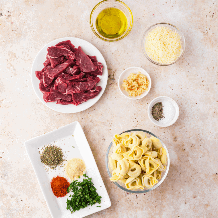 Ingredients needed for Copycat Maggiano's Beef Tenderloin Medallions Recipe on kitchen table.