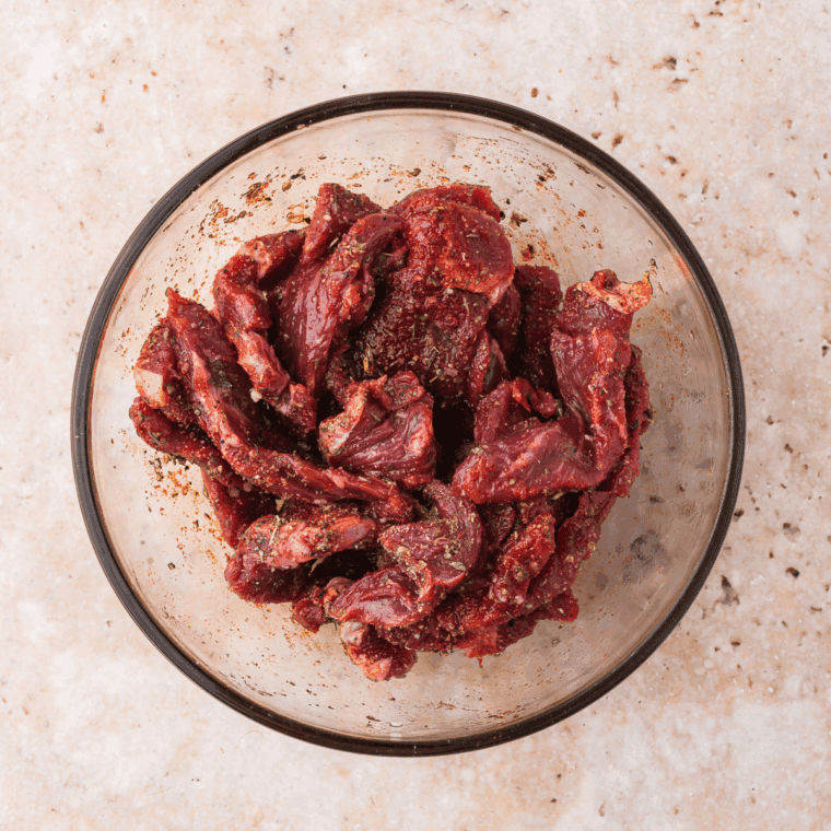 Pat the beef medallions dry with paper towels and season both sides with salt and pepper. This helps create that perfect crust when searing.