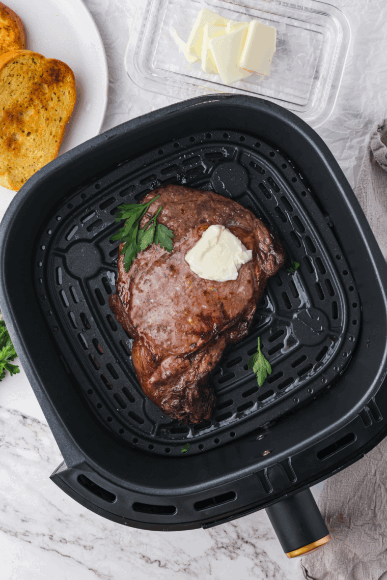 “Air fryer with preheating indicator light on before cooking food”