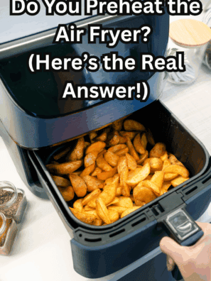 “Air fryer basket being preheated before cooking food”