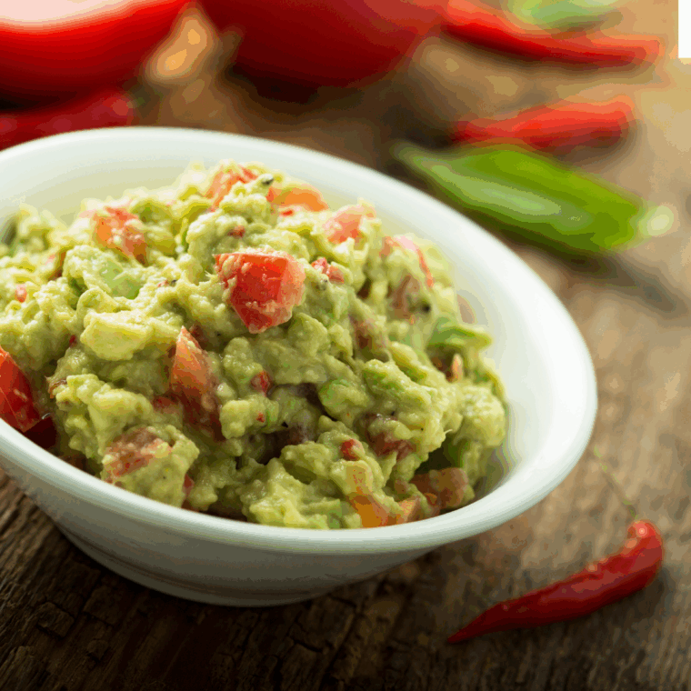 Prepared Guacamole in a small bowl.
