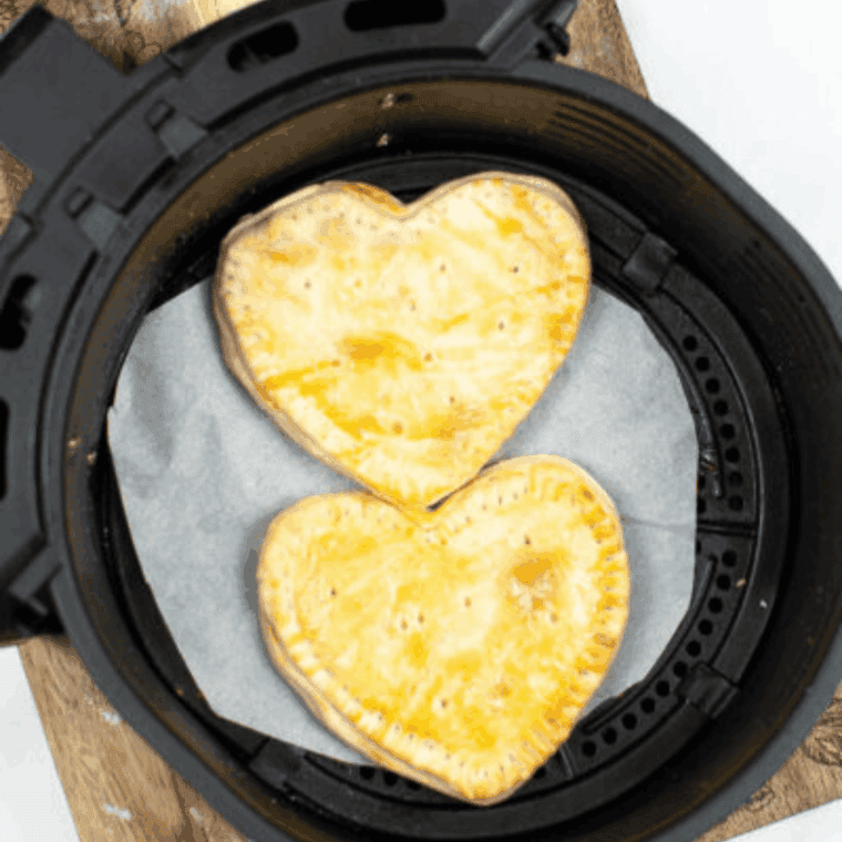 Air Fry: Pop-tarts arranged in a single layer in the air fryer basket, cooking until golden brown and flaky