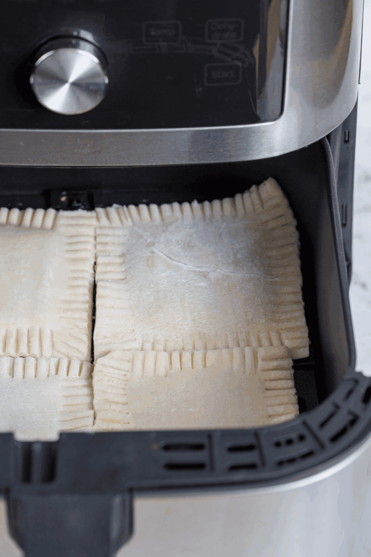 Air Fry: Pop-tarts arranged in the air fryer basket, cooking at 350°F until golden brown.