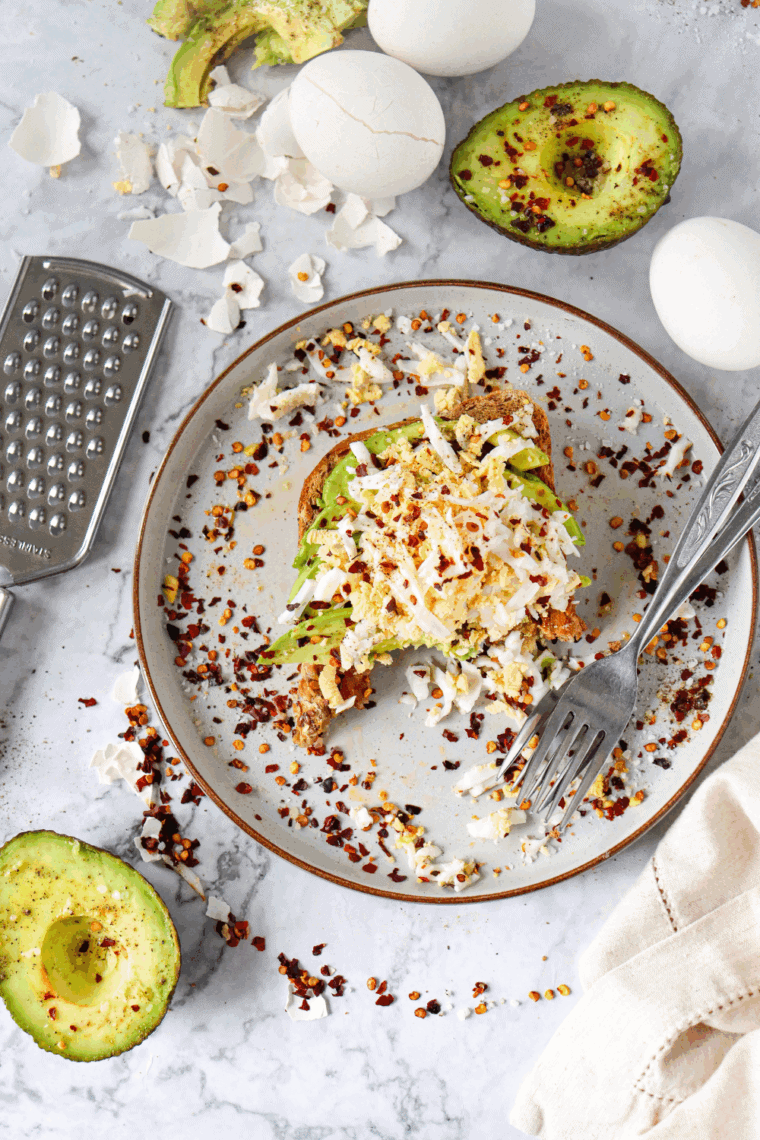 Make this easy copycat First Look Avocado Toast at home! Creamy avocado puree paired with toasted bread and fresh toppings makes for a healthy and delicious breakfast.