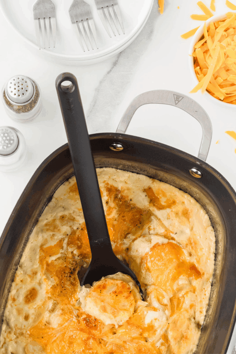 Rich, cheesy Potatoes au Gratin, a perfect copycat of the Ruth's Chris classic, ready to be served as a comforting side dish.