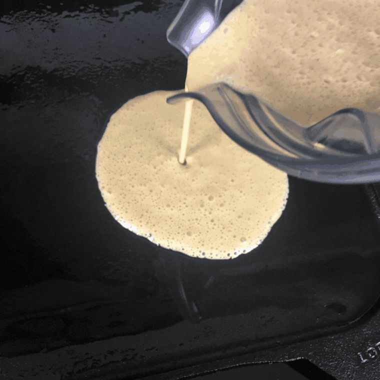 Fluffy homemade pancakes stacked on a plate, ready to serve.