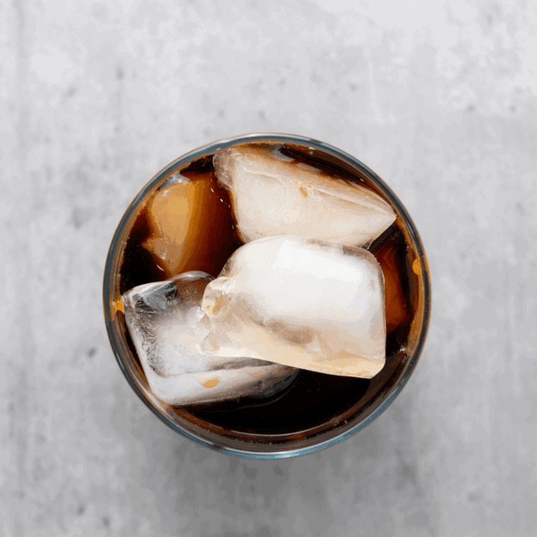 Freshly brewed coffee cooling in a carafe to room temperature.