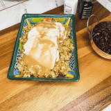 Frozen boneless turkey breast cooking in an air fryer, golden and crispy on the outside, ready to serve.