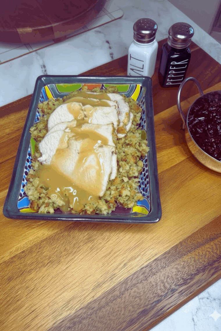 Frozen boneless turkey breast cooking in an air fryer, golden and crispy on the outside.