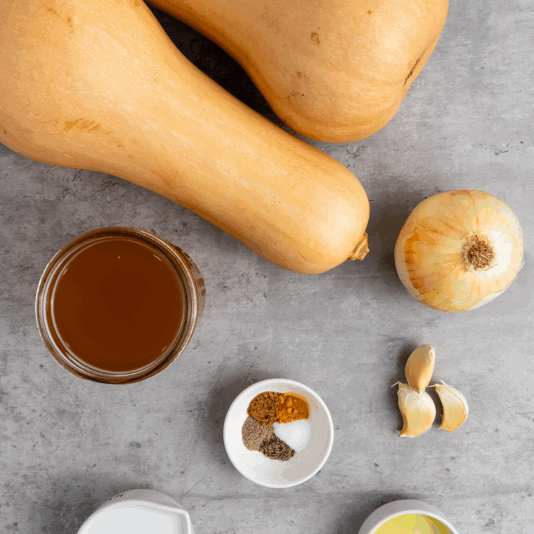 Ingredients needed for Easy Ina Garten Butternut Squash Soup Recipe on kitchen table.