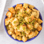 This easy Ina Garten Sausage and Herb Stuffing is rich, savory, and packed with flavor. Made with buttery bread, juicy sausage, and fresh herbs, it’s the ultimate comfort side dish for holiday dinners.