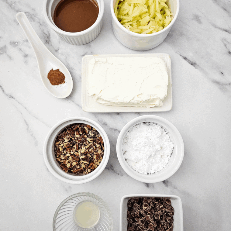 Ingredients needed for Easy Snickers Cheese Ball Recipe on kitchen table.