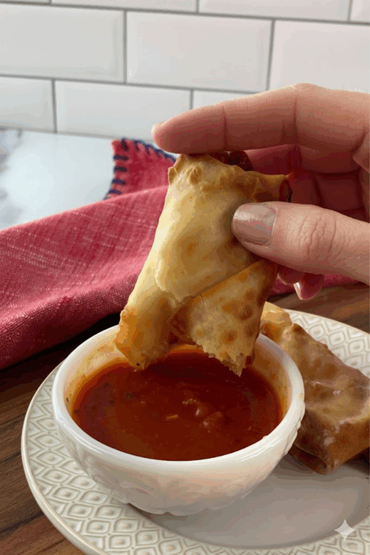 Small bowl of homemade spaghetti seasoning with mixed dried herbs and spices.