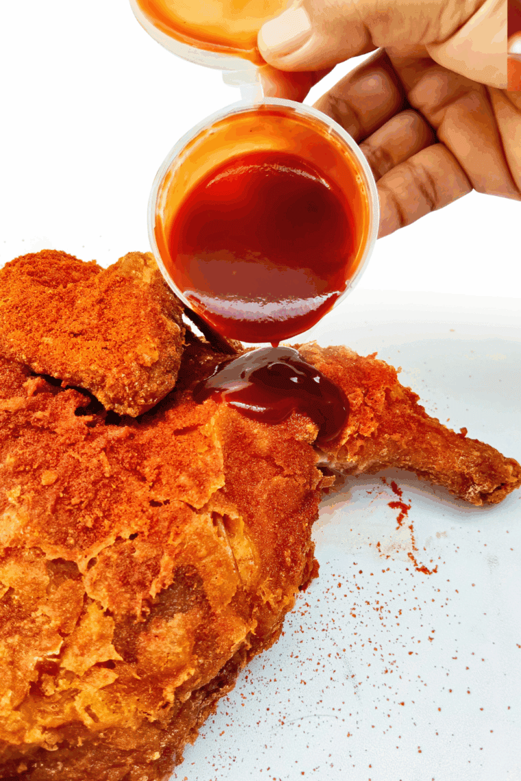 Brush fried chicken with Valentina hot sauce.