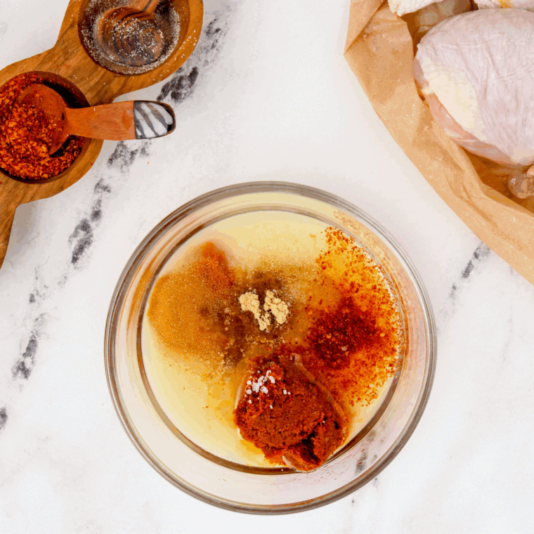 Combine Valentina hot sauce with garlic, vinegar, water, and salt in a blender and blend until smooth, ready to adjust consistency and seasoning.