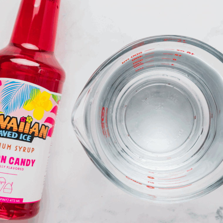 Ingredients needed for Ninja Creami Cotton Candy Italian Ice on kitchen table.