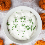 Ruth's Chris Steak House Serves blue cheese dressing in bowls with salad