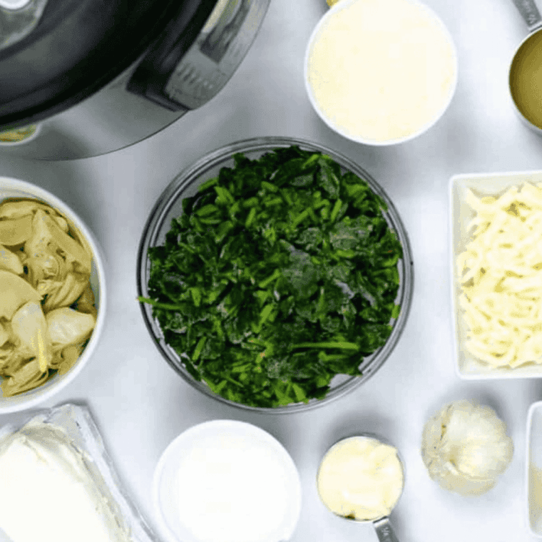 Ingredients needed for Easy Ruth's Chris Steak House Creamed Spinach on kitchen table.