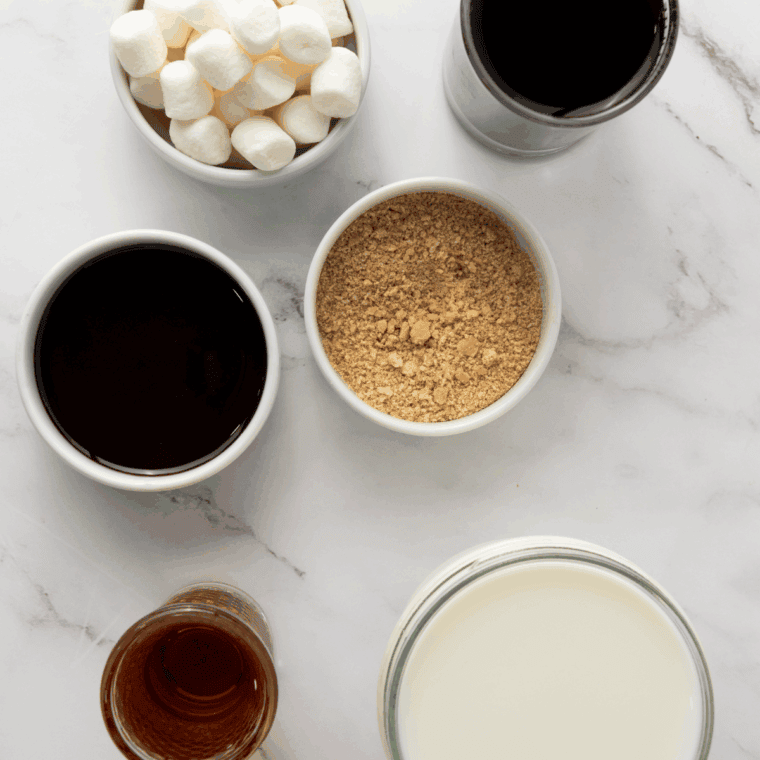 S'mores Hot Chocolate Starbucks Copycat ingredients on kitchen table.