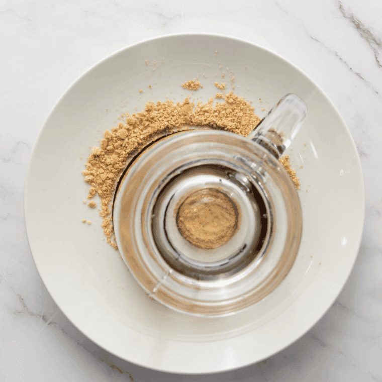 Mug rim coated with graham cracker crumbs and melted butter.